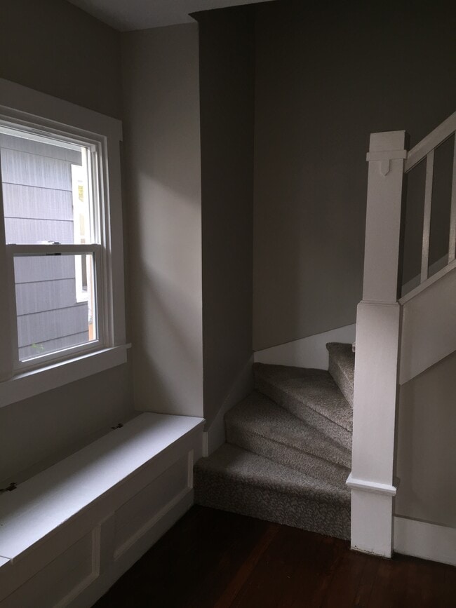 Stiairs leading to both bedrooms and bath - 813 Main St