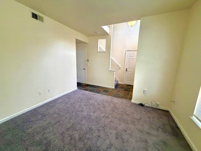 Building Photo - Freshly Painted w/ New Carpets 3 Bedroom, 2 Bath With Attached Garage
