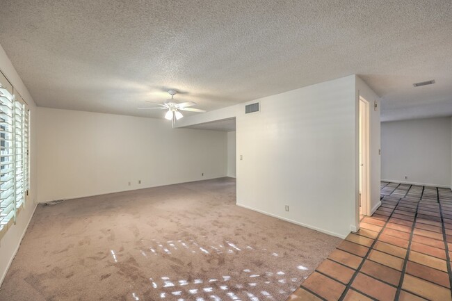 Building Photo - "Spacious 3-Bedroom Oasis with 1.5 Baths i...