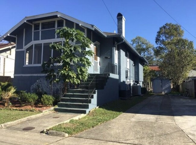 Large front porch living with off-street parking, yard & garage storage - 2427 Calhoun St