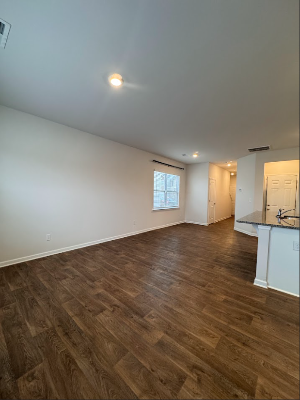 Primary Photo - Stylish 3-Bedroom Townhome with Modern Ame...