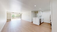Located at 693 Mccloud Ave in Thousand Oaks, CA, this well-appointed one-bedroom, one-bathroom residence offers a clean, modern aesthetic throughout. Light wood-tone flooring runs continuously across the single floor, complementing the crisp white walls and recessed lighting that keep the space feeling bright and airy.

The open-concept kitchen and living area serves as the heart of the home. The kitchen is outfitted with white shaker cabinetry, marble-look quartz countertops, a tile backsplash, and a full suite of stainless steel appliances including a gas range, built-in microwave, refrigerator, and dishwasher. A peninsula provides additional counter space and opens seamlessly into the living area, which is bathed in natural light from large sliding glass doors. These doors lead to a private balcony with lush outdoor views, and the living room also features a built-in bookshelf for added character.

The generously sized primary bedroom includes a sliding-door closet and a window overlooking the balcony, filling the room with natural light. Additional storage is provided by multiple closets throughout the unit. The bathroom is finished with white cabinetry, a single vanity, and a full tub/shower combination. Hallways connect all areas cleanly, completing this well-organized and thoughtfully designed residence.