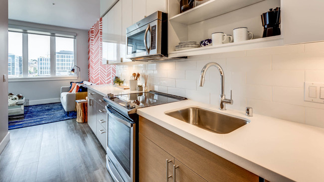 Kitchen with Stainless Steel Appliances and Quartz Countertops - Mark on 8th