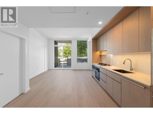 Photo du bâtiment - 5212-5212 Cambie Rd