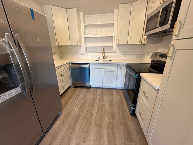 Building Photo - Fully Renovated 3-Bedroom Home with AC & L...
