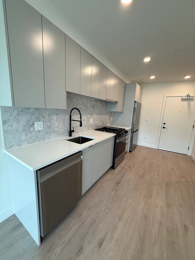 Building Photo - 13238-13105 105 Ave