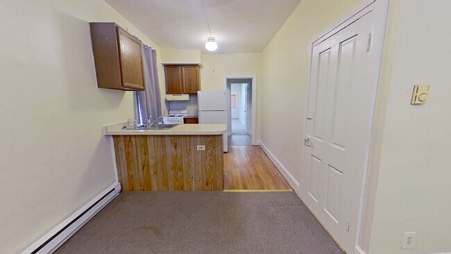 Building Photo - 1st Floor Apartment
