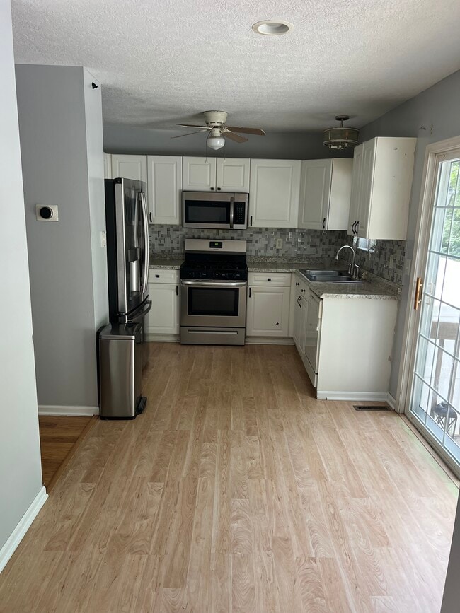Kitchen and dining room - 8282 Catalpa Ridge Dr