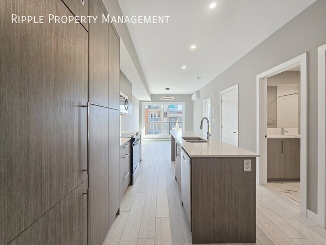 Photo du bâtiment - BRAND NEW 2 BEDS, 2 BATHS CONDO | PRIME BELTLINE LOCATION | CENTRAL A/C