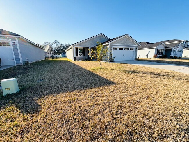 Building Photo - Move-In Ready 3BR Home with Open Layout, Garage & Water Views