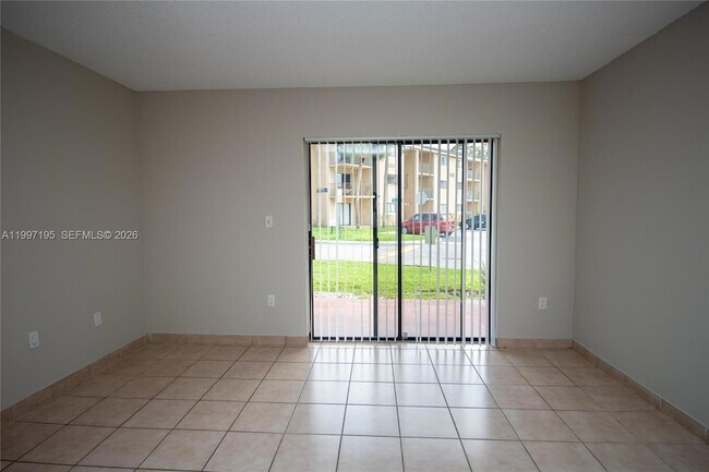 Building Photo - 9491 Palm Cir S