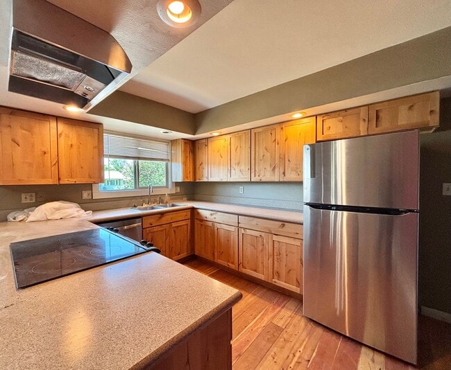 Building Photo - Spacious 4-Bedroom, 2-Bath Home with Room ...