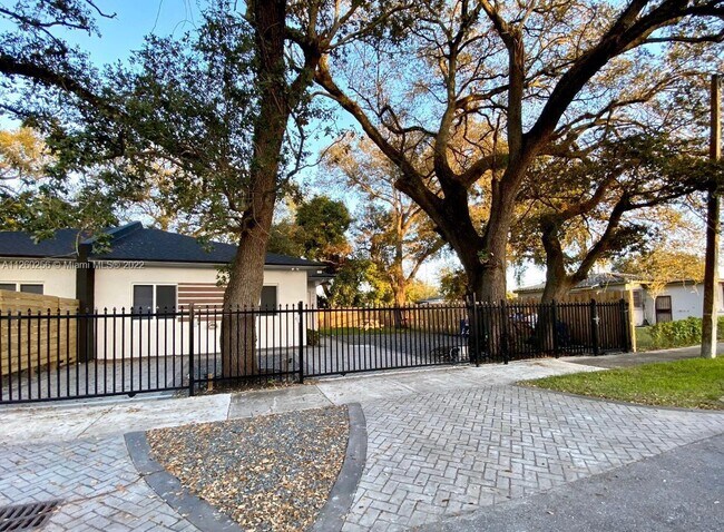 Building Photo - 9995 NW 23rd Ave