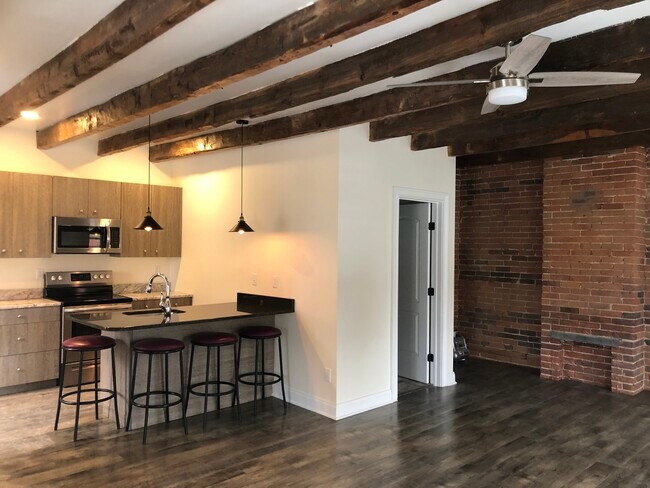 Open Floor plan, exposed timbers - 74 Warren St