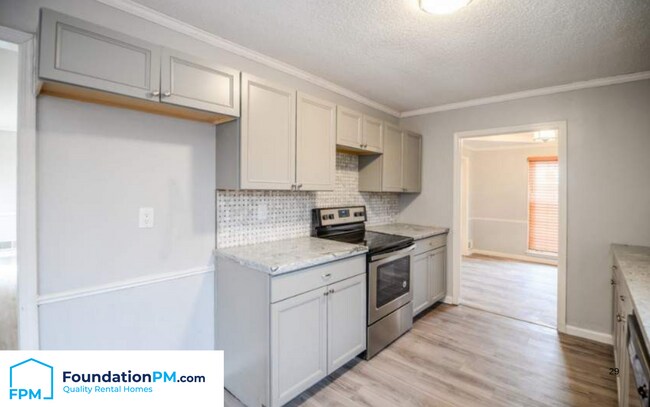 Foto del edificio - 411 Plum Point Pl