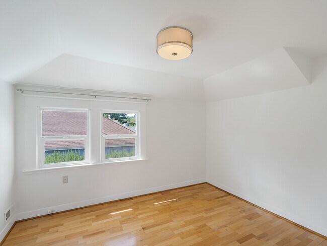 Bedroom 1, full of light - 1215 SE Lexington St