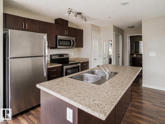 Building Photo - #325 5515 7 AV SW