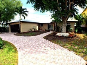 Building Photo - 3100 NE 56th Ct