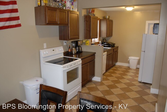 Building Photo - 7 br, 4 bath Apartment - 303 E 10th St