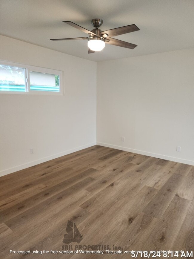 Building Photo - Welcome to this stunning 4-bedroom, 3-bath...