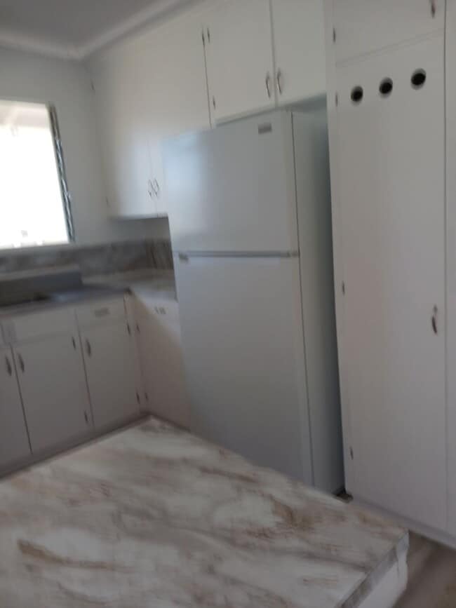 Building Photo - COZY 1 BEDROOM IN CONVENIENT KAPAHULU