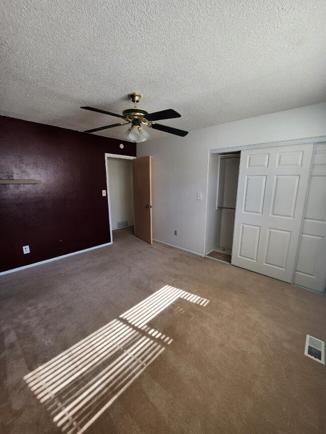 Bedroom with slide-door closet - 3854 Constitution Ave