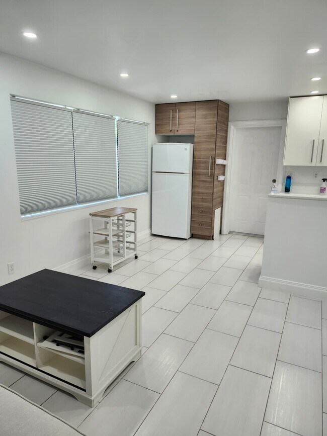 Kitchen and living room view. - 2415 Thomas St