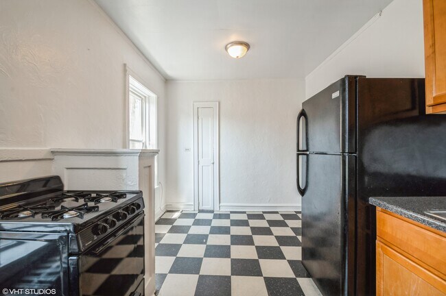 Foto del edificio - Portage Park Studio w/ sep dining,ss, hard...