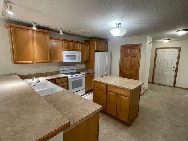 Open Kitchen w/ Island and Pantry - 2916 Kentville Dr