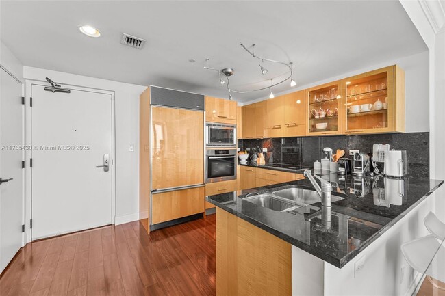 Building Photo - 6799 Collins Ave