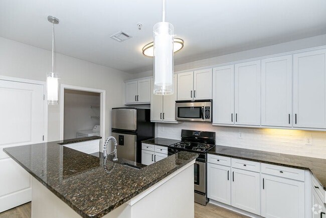 Building Photo - The Reserve at Johns Creek Walk