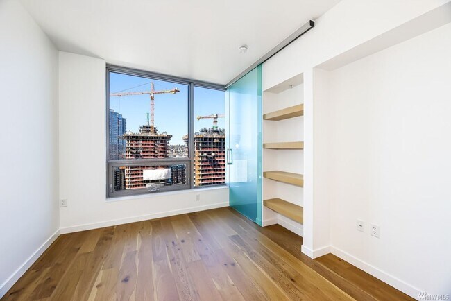 Building Photo - Spacious NW-Facing 1 Bed + Den, 1 Bath Luxury High-Rise Condo in Seattle's Denny Triangle – Nexus