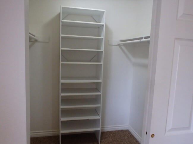 Walk in closet with shelving - 10226 Black Mountain Rd