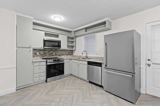 Foto del edificio - 1303 W Meadowview Rd