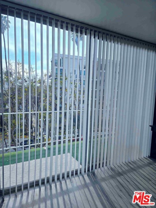 Building Photo - 100 S Doheny Dr