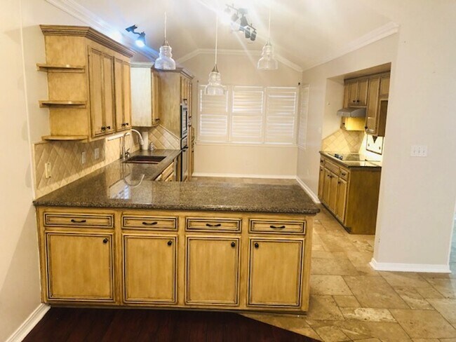Building Photo - 1/2 OFF FIRST MONTH'S RENT - University Te...