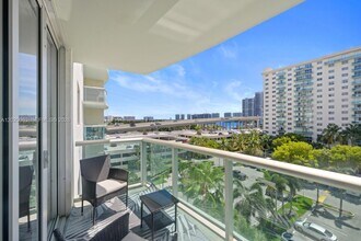 Building Photo - 19380 Collins Ave