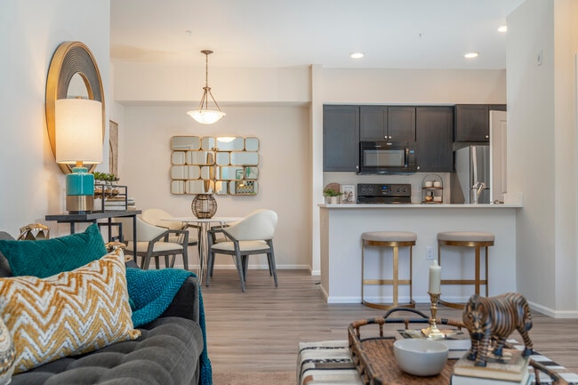 1x1 Deluxe l Model Living Room + Dining Room + Kitchen - 1500 Orchard Apartments
