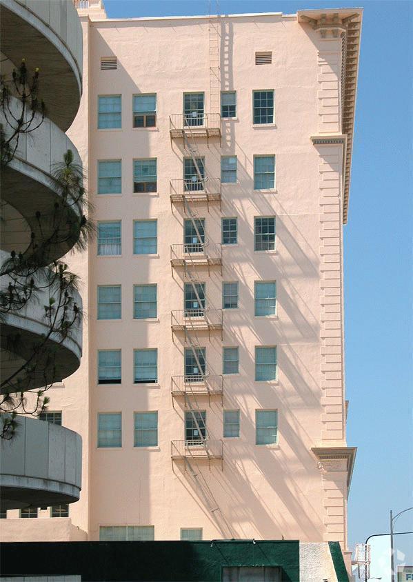 Shadows from the fire escape on the building's south face - The Californian