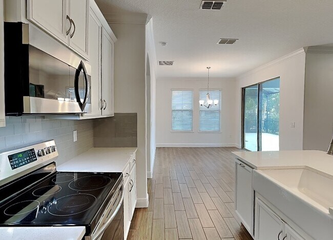 Building Photo - 9681 Waterway Passage Dr