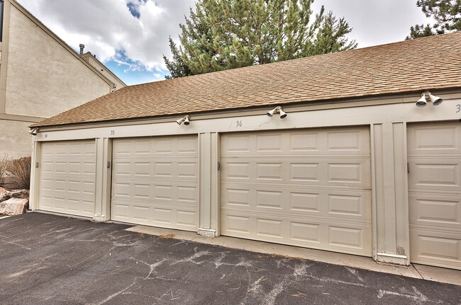 Garage parking with storage - 36 Racquet Club Dr