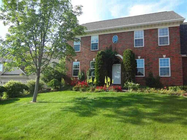 Brick front, basketball hoop driveway, large 2 car garage - 765 Breconshire Ln