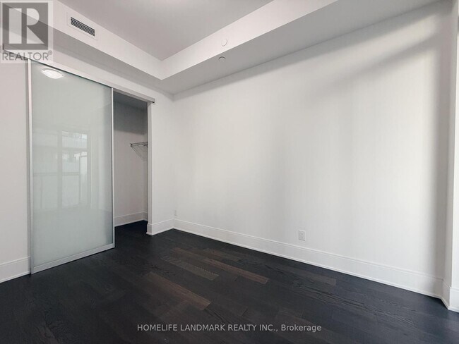 Building Photo - 50 Charles St E