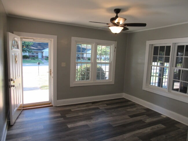 Building Photo - Check out this beautifully renovated white...