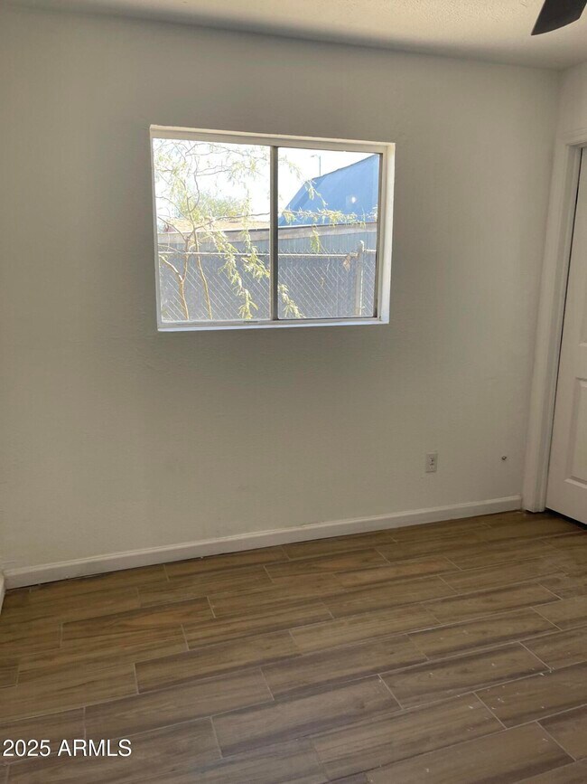 Building Photo - 1203 N Myers Blvd