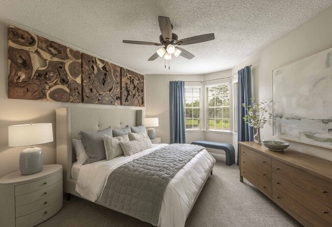 Bright, spacious primary bedroom suite - Golf Brook Apartments