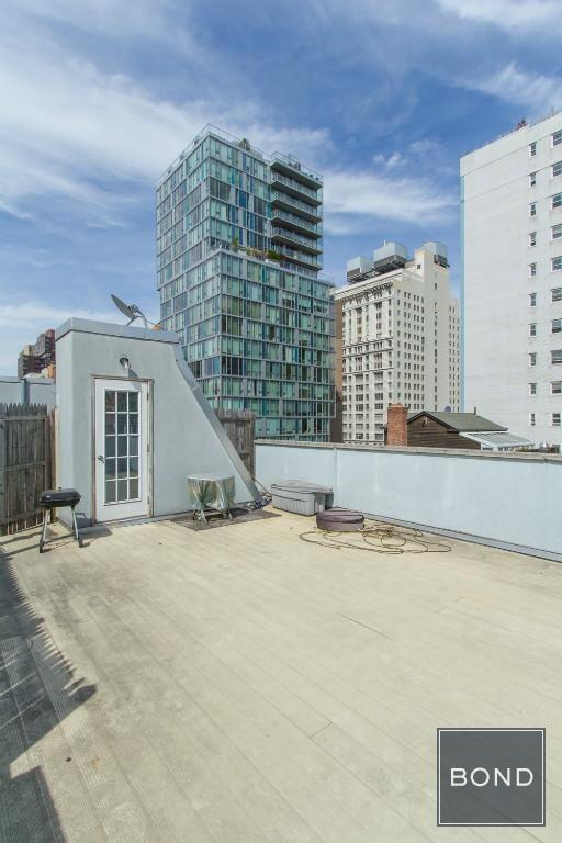 Foto principal - 202 E 13th St