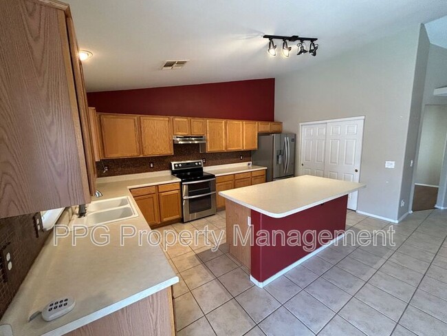 Building Photo - 13444 W Paradise Ln