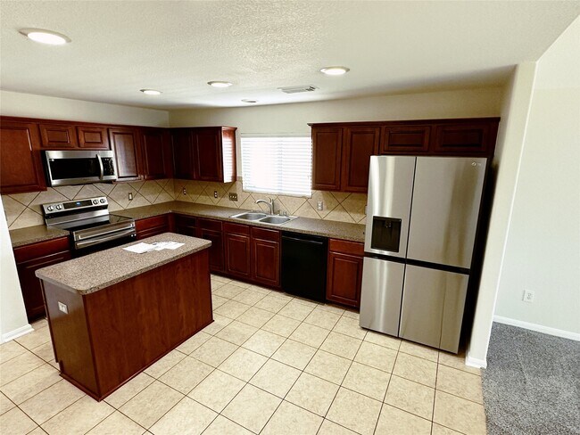 Foto del edificio - 10210 Canyon Rose Ln