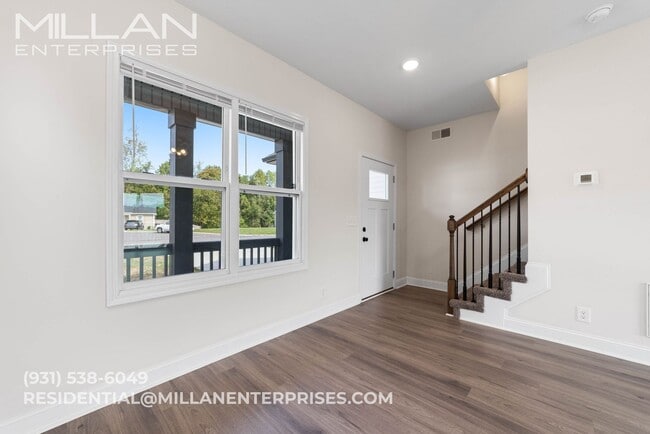 Building Photo - Spacious And Updated Home Featuring Open F...